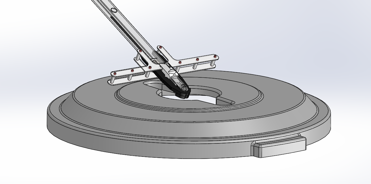 CAD of the bolt tip entering the bin lid, with the cross-shaped wing meeting the lid surface