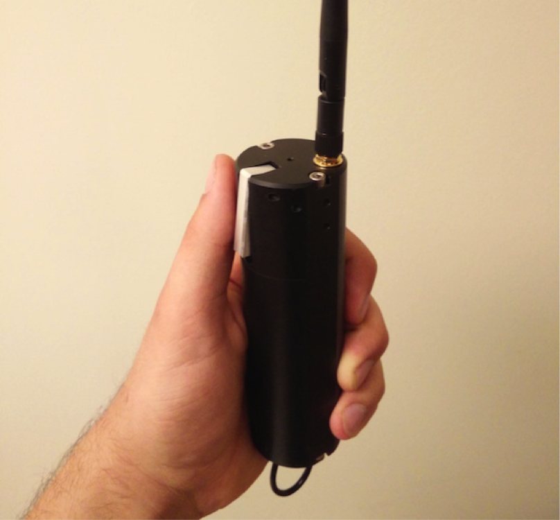 The handheld wireless e-stop with its antenna